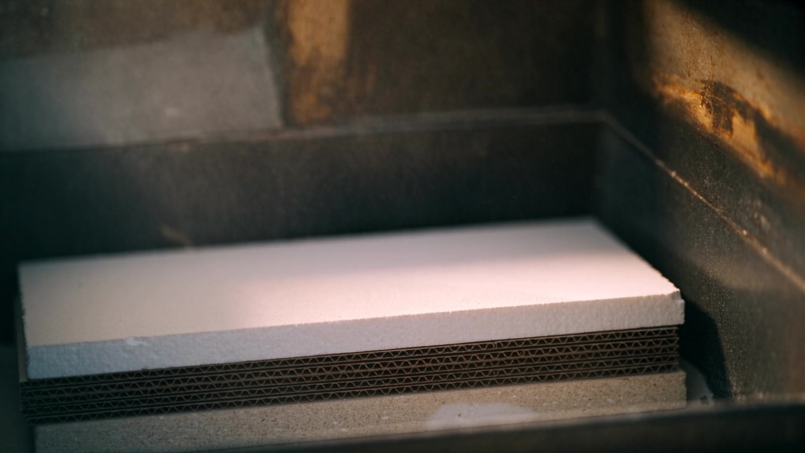 Settled layers of industrial material at rest